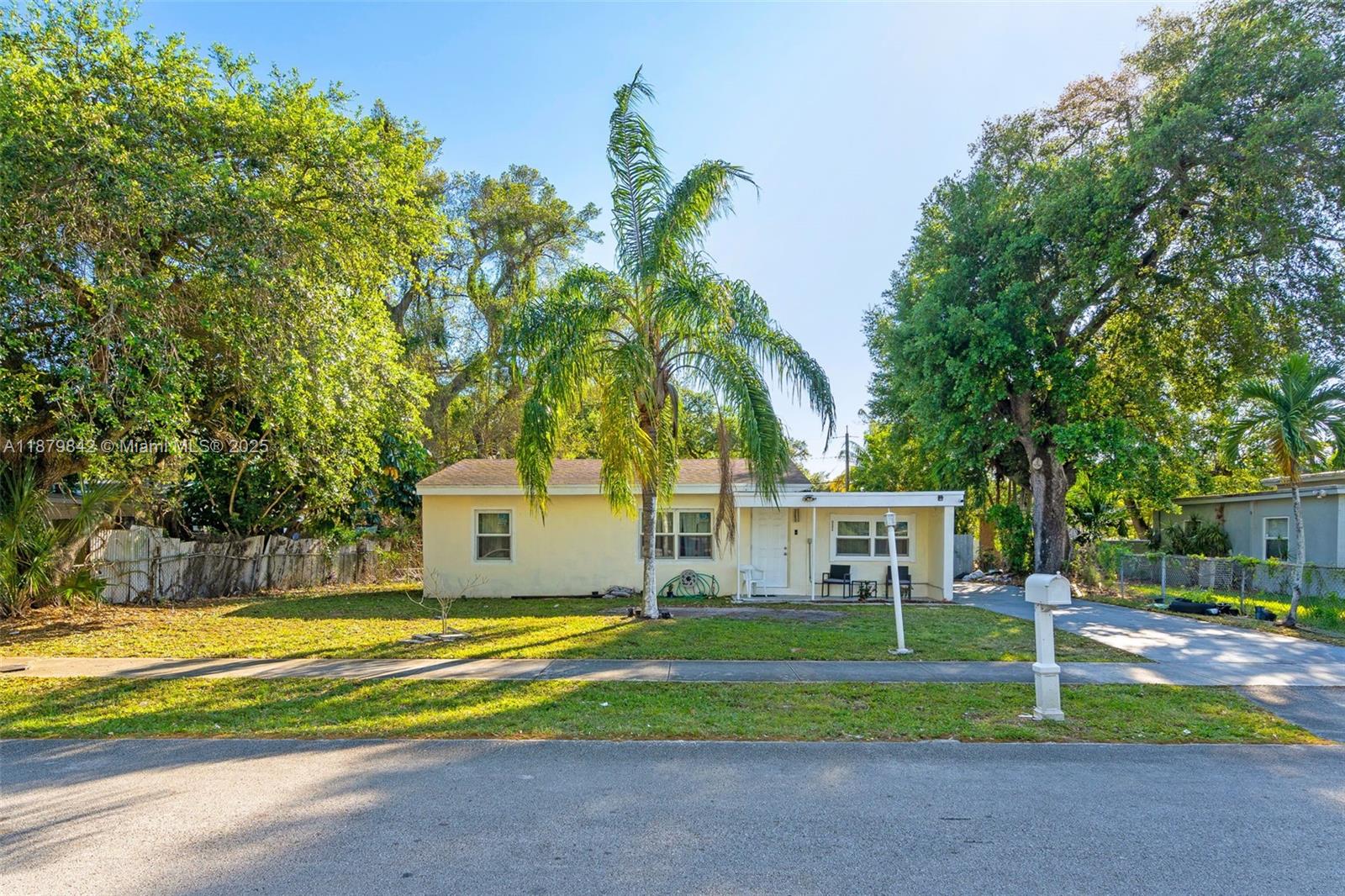 114 Marion Road West Park, FL 33023 - Photo 2 of 24 a view of house with outdoor space and swimming pool