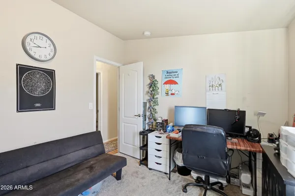 a view of workspace with lounge chair