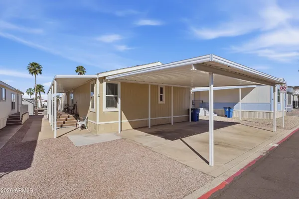 a house view with a backyard space