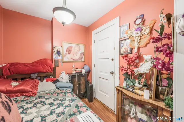 a bed room with a bed and a couch