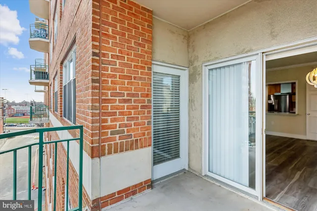 a view of a balcony with a door