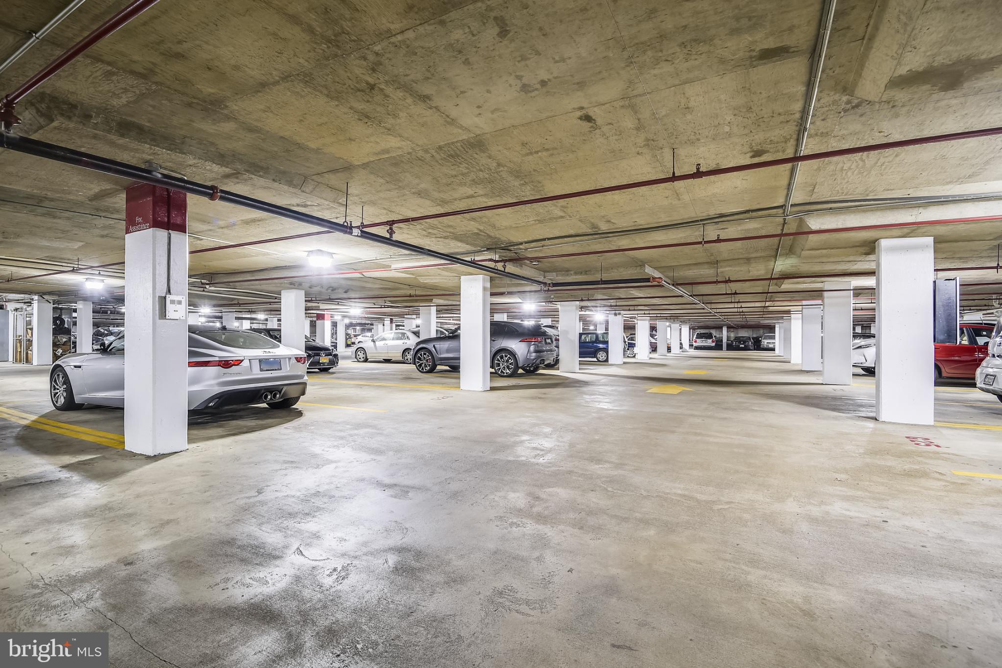 3801 Canterbury Road, Unit 404 Baltimore, MD 21218 - Photo 24 of 37 a view of a car park in front of a building