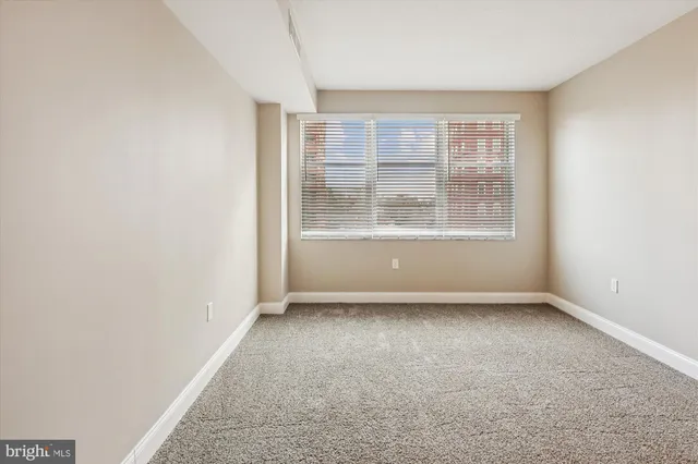 an empty room with a window