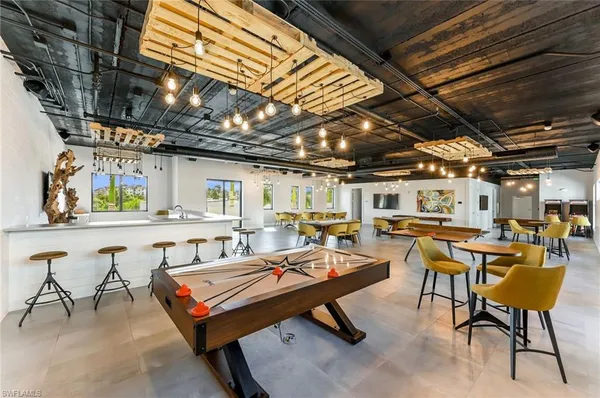 a view of dining room with furniture and wooden floor