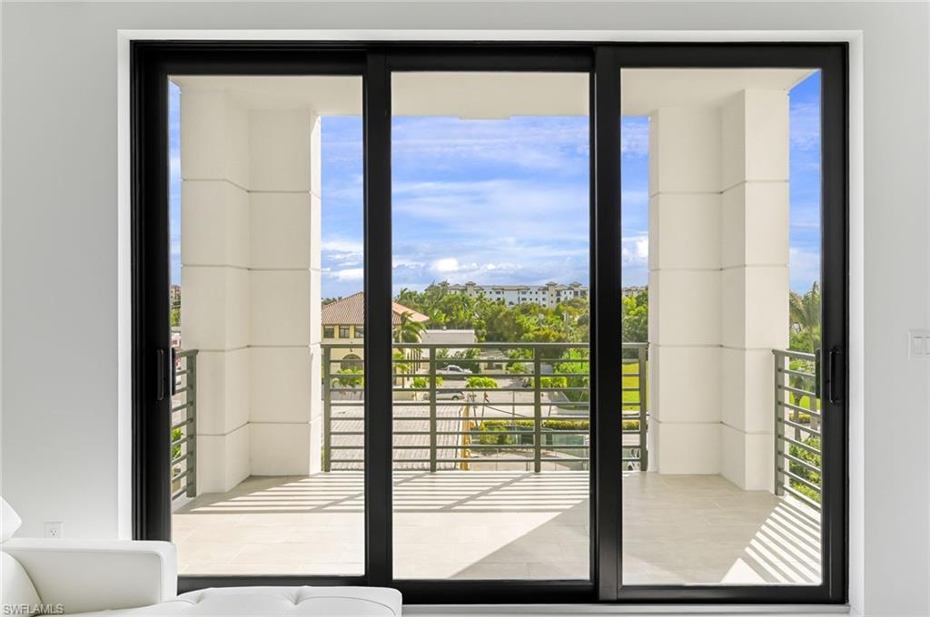 1111 Central, Unit 417S Naples, FL 34104 - Photo 6 of 25 a view of a room with a large window