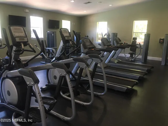 a view of a room with gym equipment