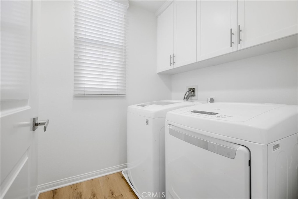 148 Capricorn Irvine, CA 92618 - Photo 22 of 66 a utility room with dryer and washer
