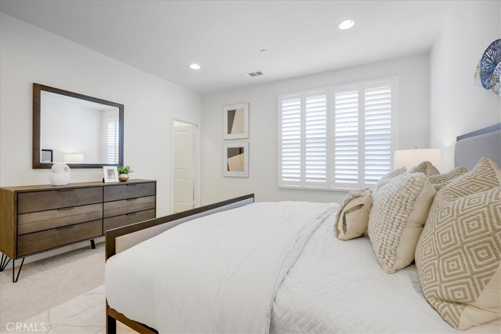 148 Capricorn Irvine, CA 92618 - Photo 37 of 66 a bed room with a bed and a dresser