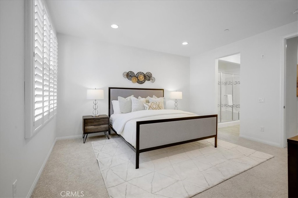 148 Capricorn Irvine, CA 92618 - Photo 39 of 66 a bed sitting in a bedroom next to a window
