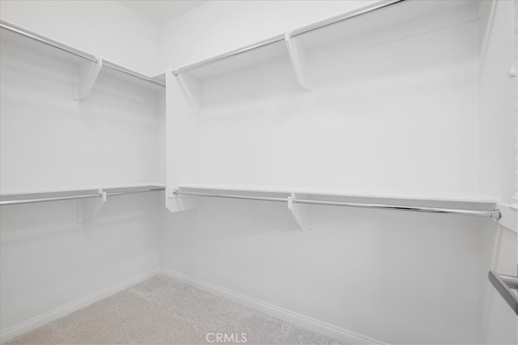 148 Capricorn Irvine, CA 92618 - Photo 43 of 66 a view of an empty walk in closet