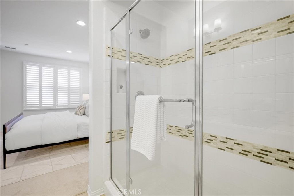 148 Capricorn Irvine, CA 92618 - Photo 46 of 66 a bathroom with a tub shower vanity and a sink