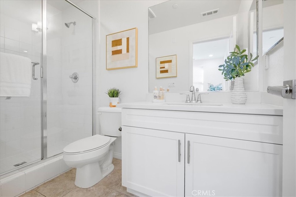 148 Capricorn Irvine, CA 92618 - Photo 8 of 66 a bathroom with a sink toilet and shower