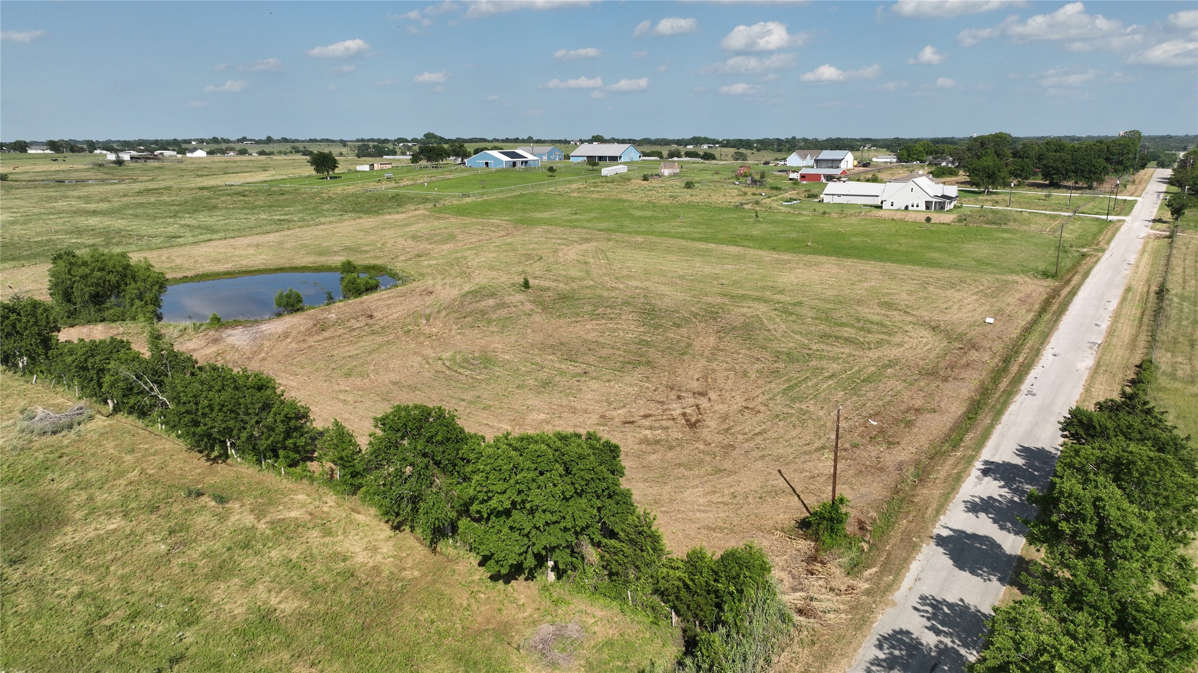 Tbd Helm Road Burton, TX 77835 - Photo 2 of 11 a view of a lake with a big yard