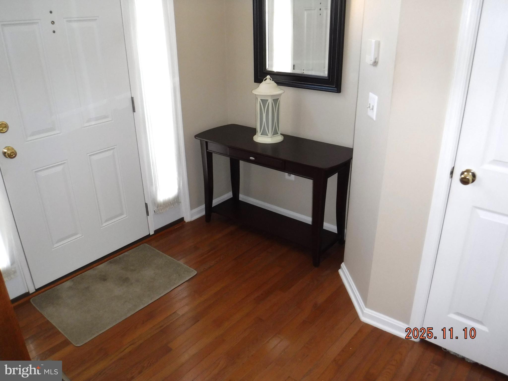 8918 Whitetail Court Perry Hall, MD 21128 - Photo 19 of 64 a view of front door with wooden floor