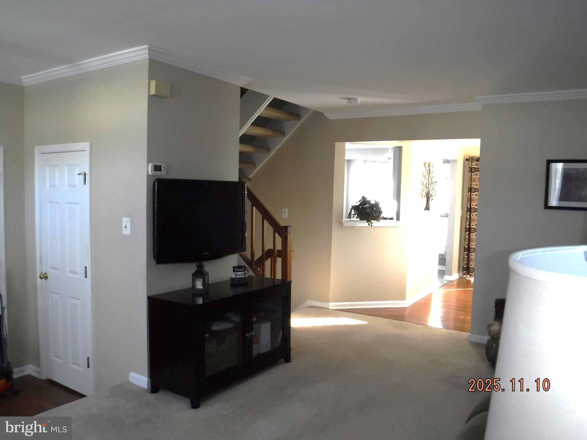 8918 Whitetail Court Perry Hall, MD 21128 - Photo 27 of 64 a living room with furniture and a flat screen tv