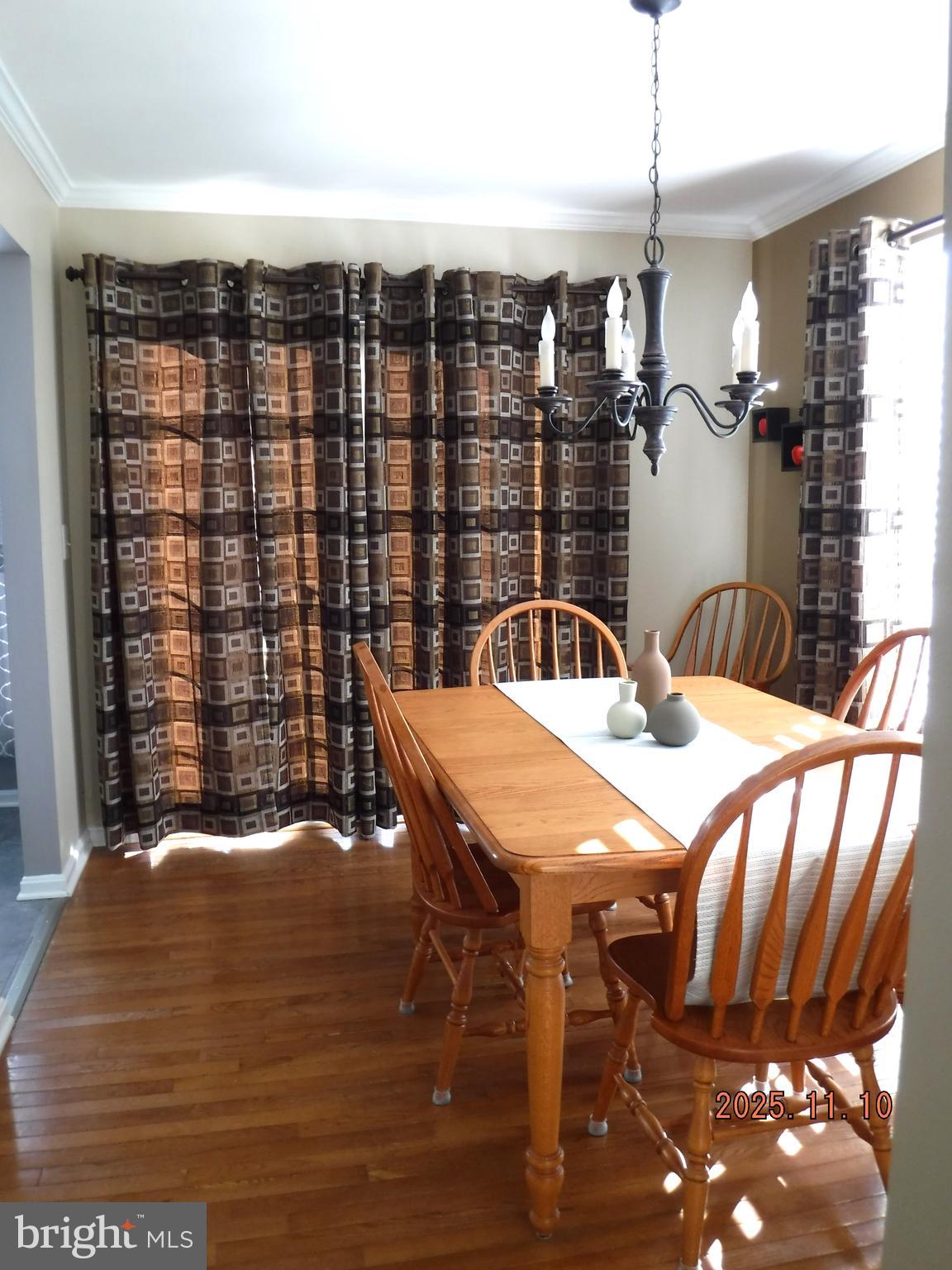 8918 Whitetail Court Perry Hall, MD 21128 - Photo 30 of 64 a dining room with furniture and wooden floor