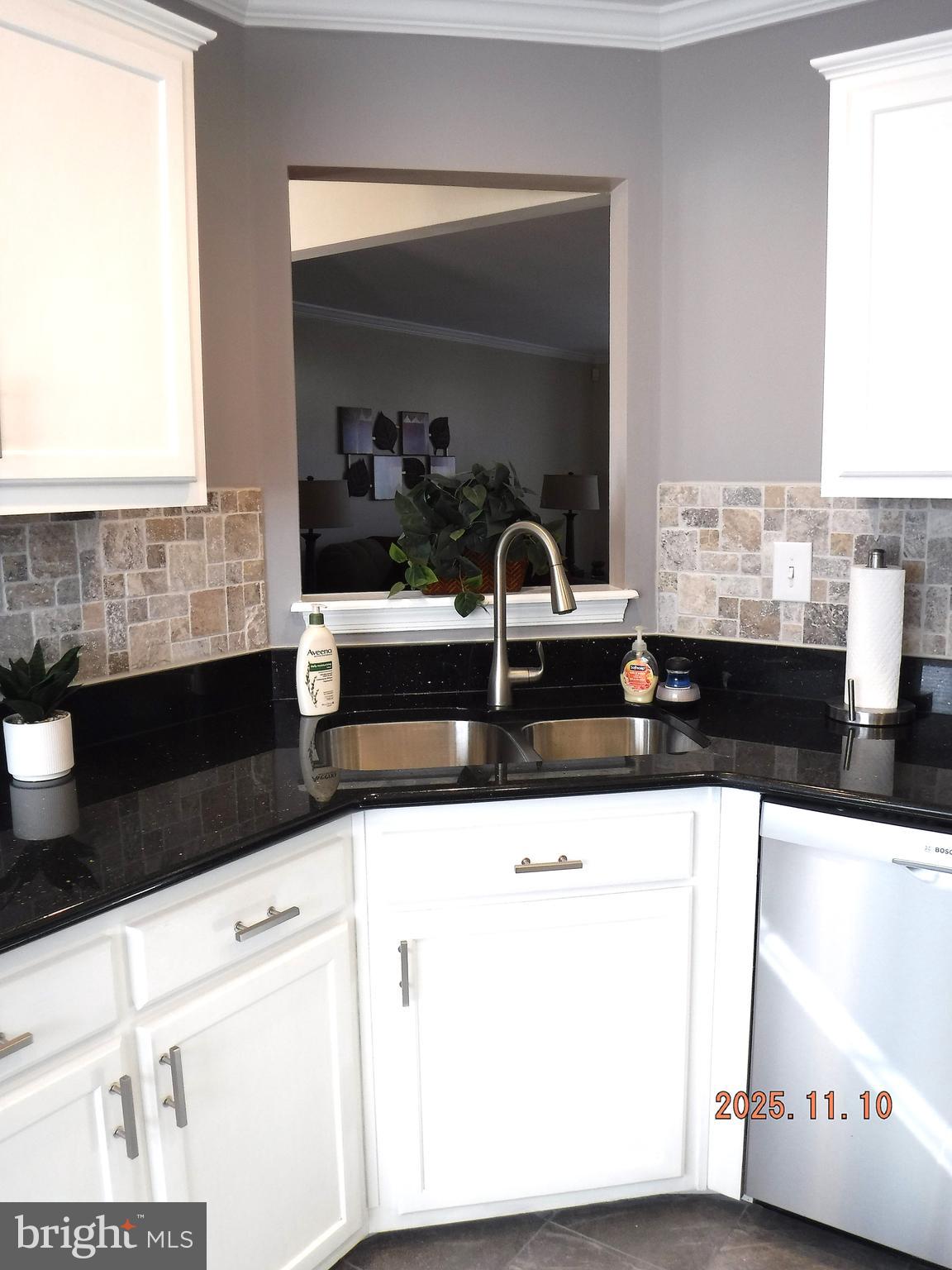 8918 Whitetail Court Perry Hall, MD 21128 - Photo 31 of 64 a bathroom with a sink and a mirror