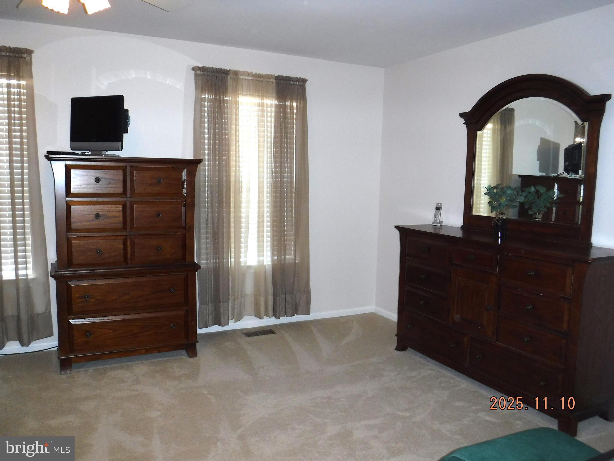 8918 Whitetail Court Perry Hall, MD 21128 - Photo 37 of 64 a living room with furniture and a flat screen tv