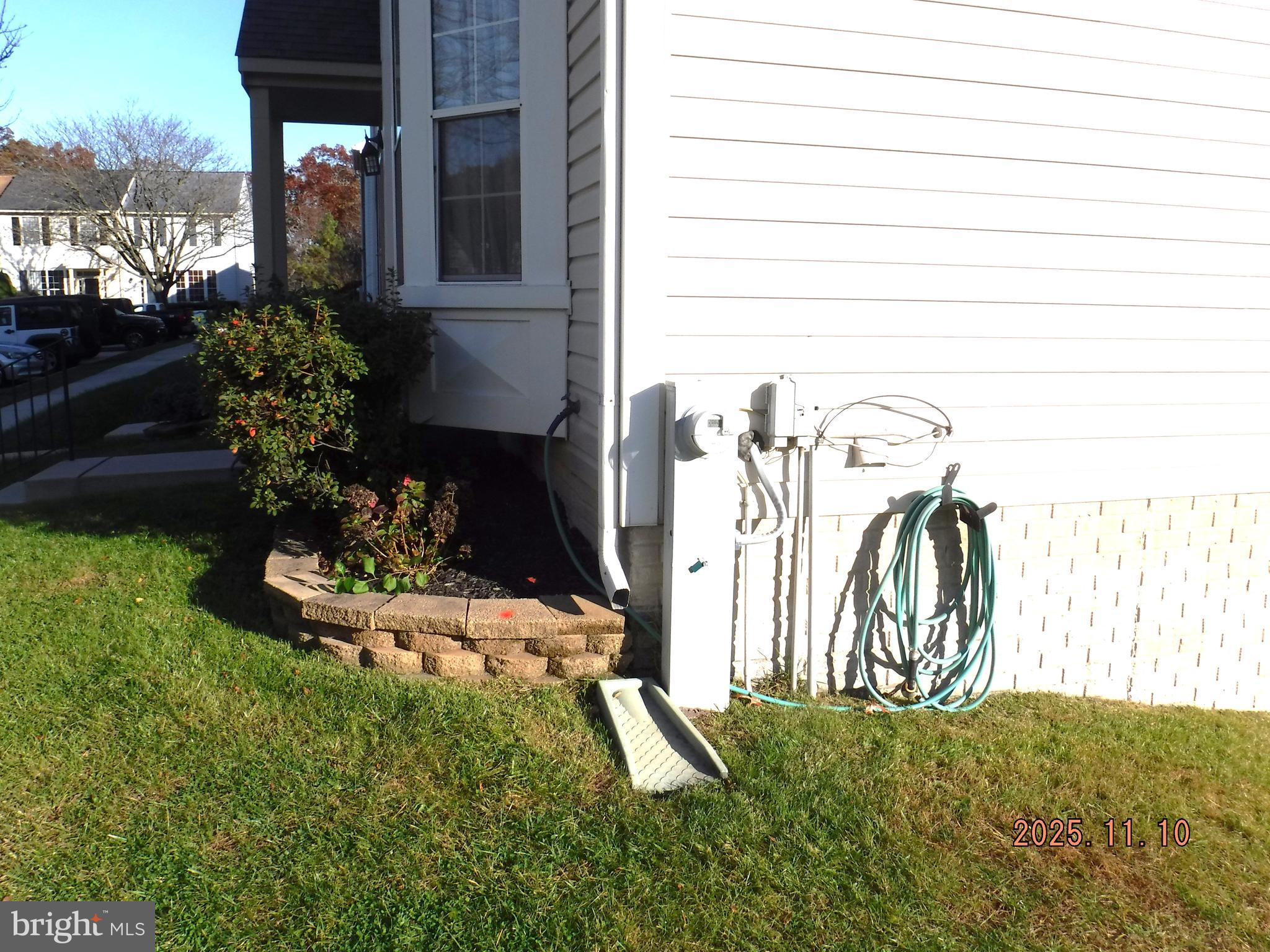 8918 Whitetail Court Perry Hall, MD 21128 - Photo 7 of 64 a view of a backyard with plants and a fountain