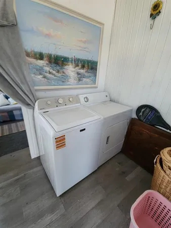 a utility room with washer and dryer