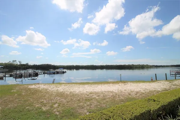 a view of a lake from a yard