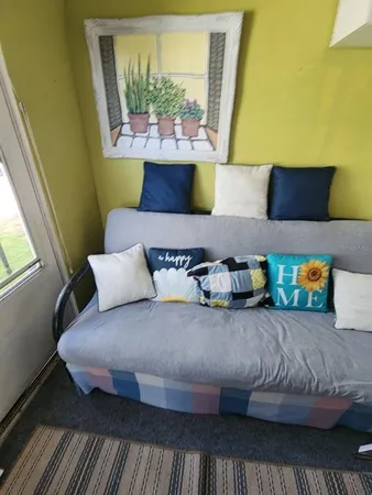 a living room with a couch and a table