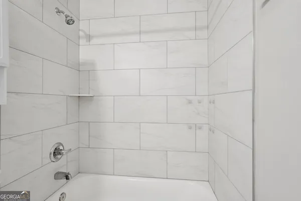 a bathroom with a bathtub