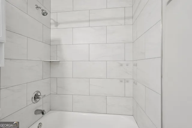 a bathroom with a bathtub