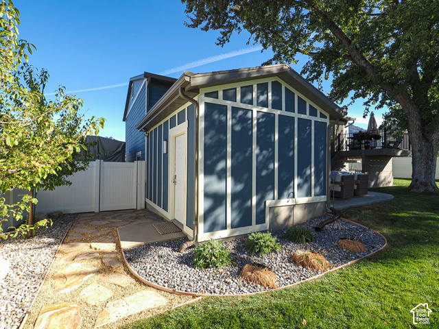 3308 Willow Ridge Road Salt Lake City, UT 84121 - Photo 6 of 59 Detached outbuilding with vertical siding and trim details