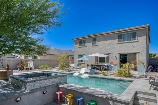 aerial view of a house with a garden and plants
