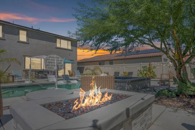 a view of a patio in backyard