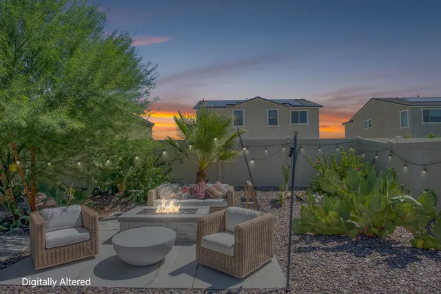 a view of a patio in backyard