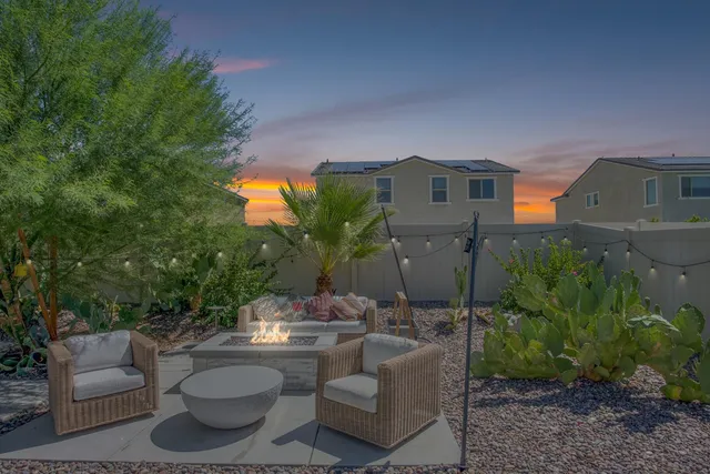an aerial view of residential houses and outdoor space