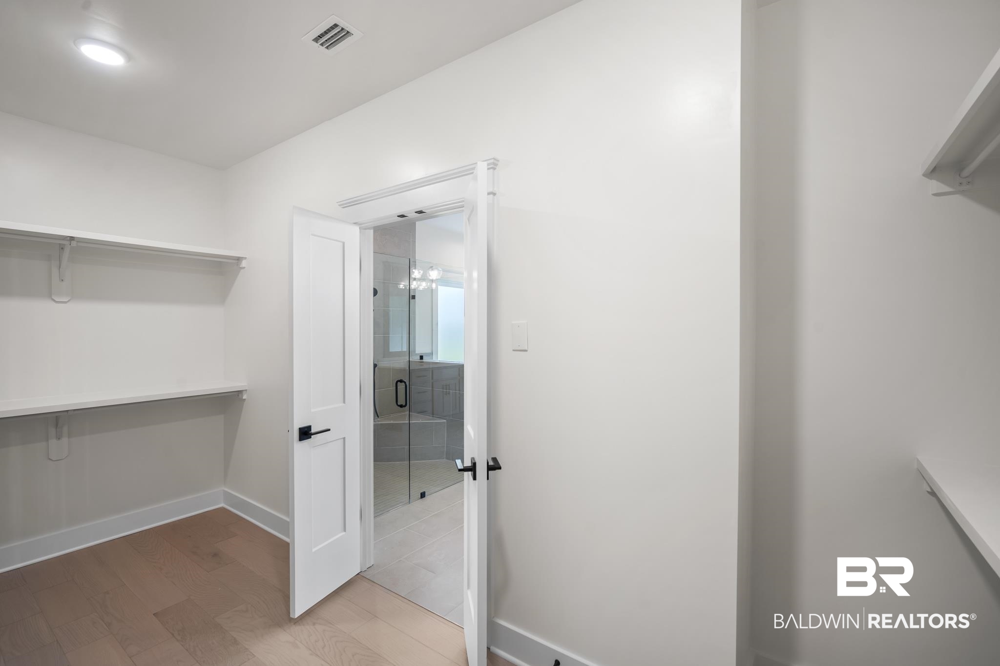 21826 Veranda Boulevard Fairhope, AL 36532 - Photo 22 of 42 Spacious closet with light wood-style floors