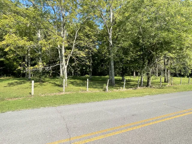 a view of a park with swings and slides
