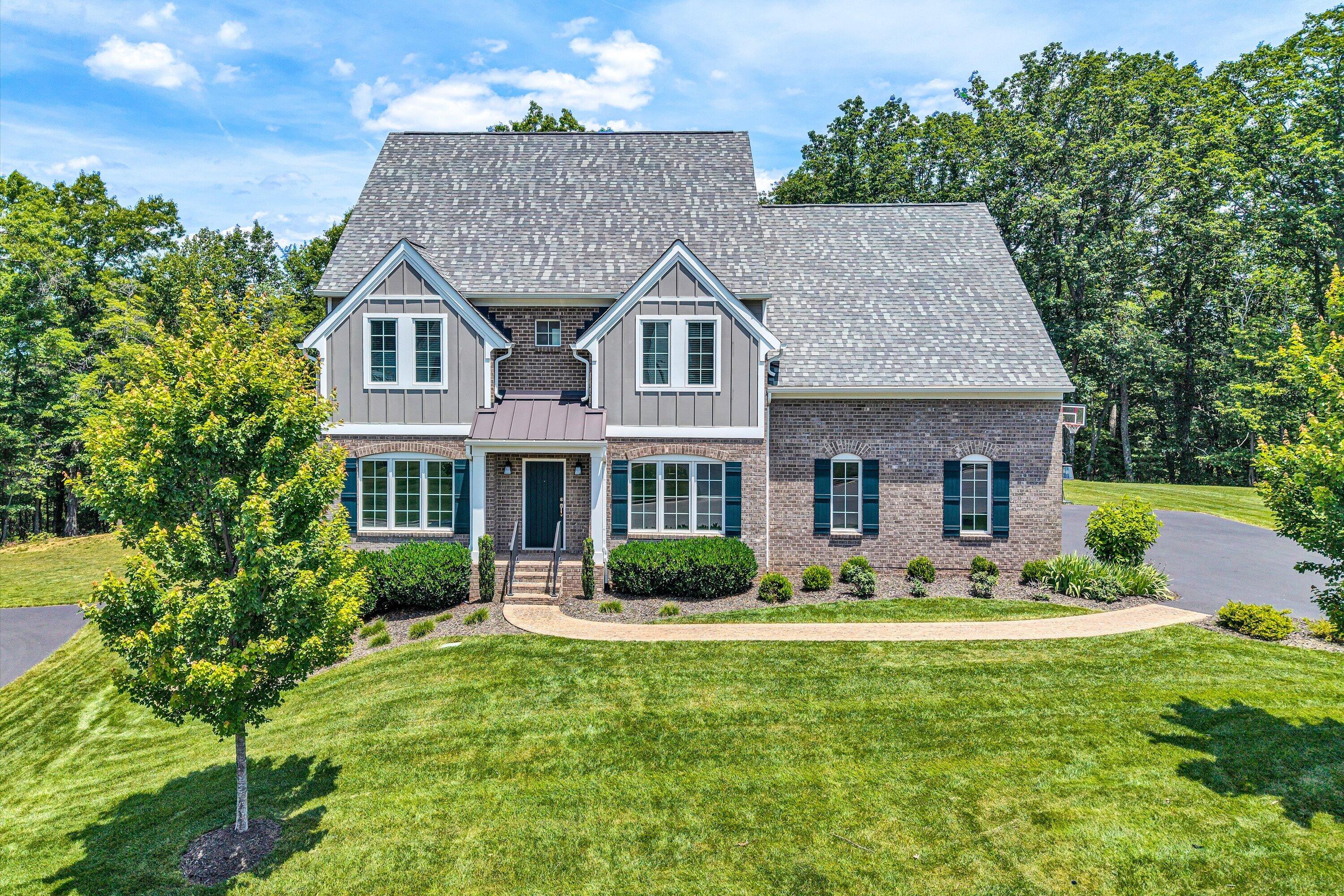 6981 Fairway Ridge Road Salem, VA 24153 - Photo 1 of 53 a front view of a house with garden