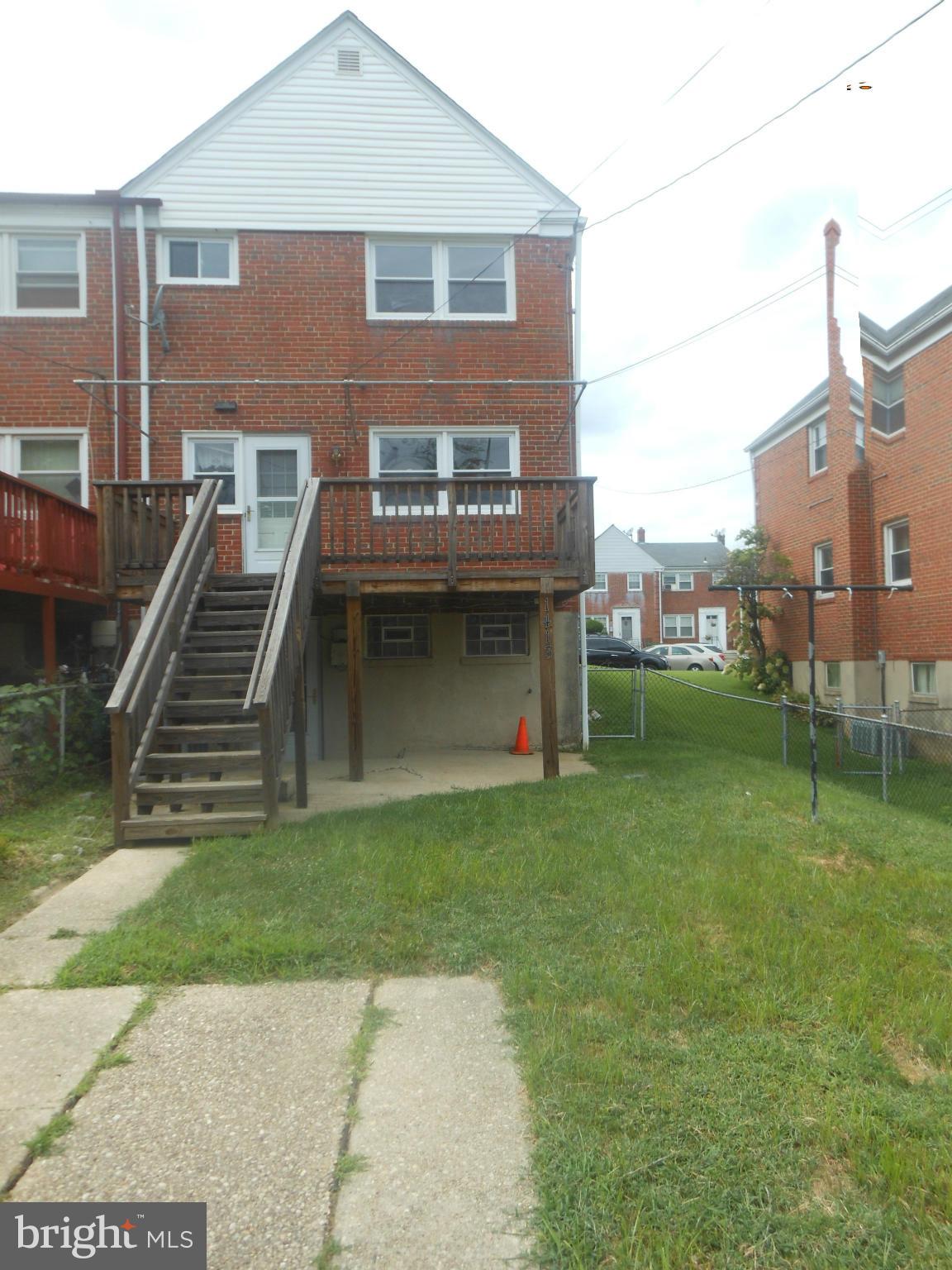 1413 Barrett Road Baltimore, MD 21207 - Photo 13 of 13 a view of a house with a yard