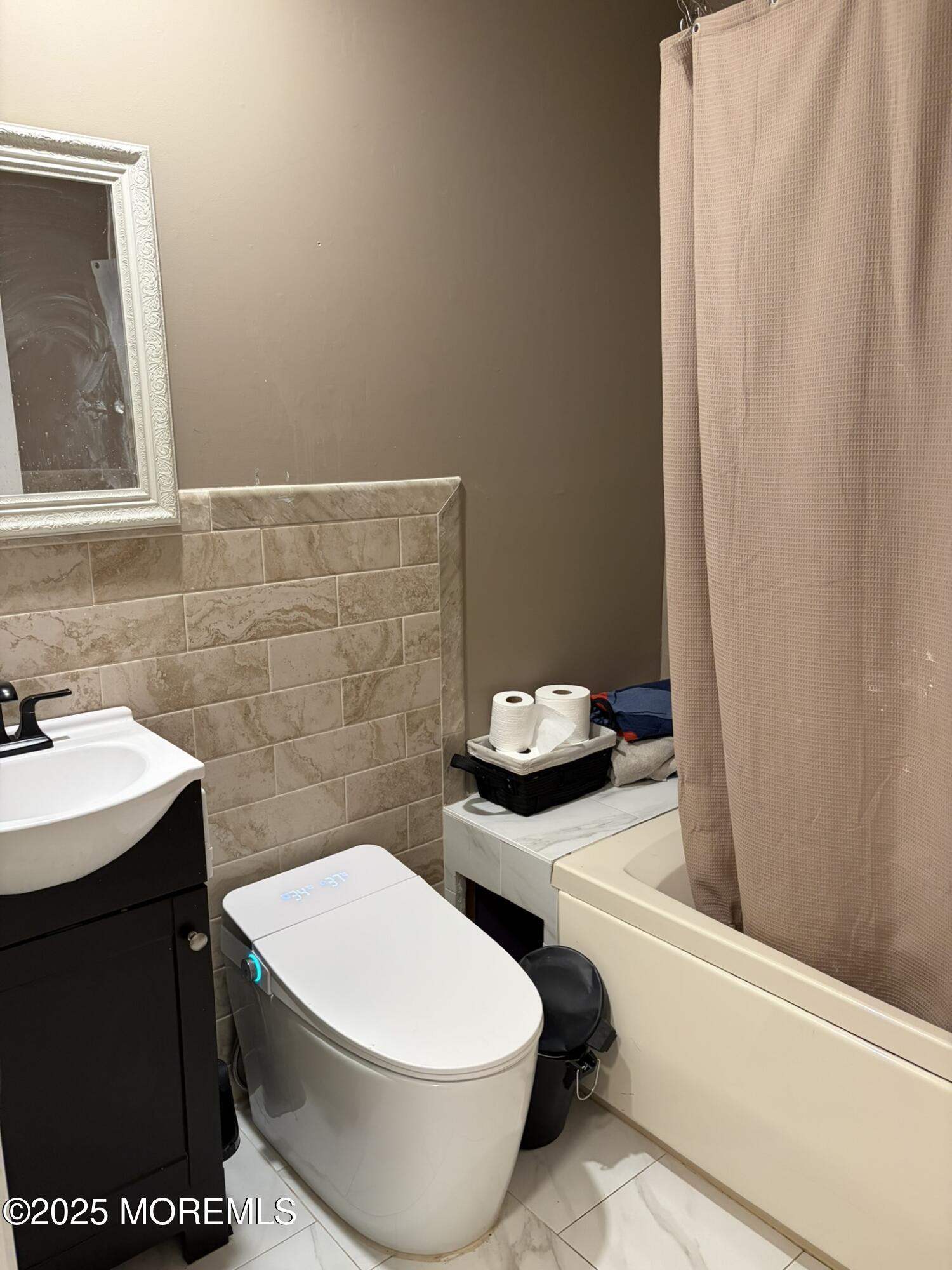 11 Chestnut Ridge Road Holmdel, NJ 07733 - Photo 19 of 44 a bathroom with a sink and toilet
