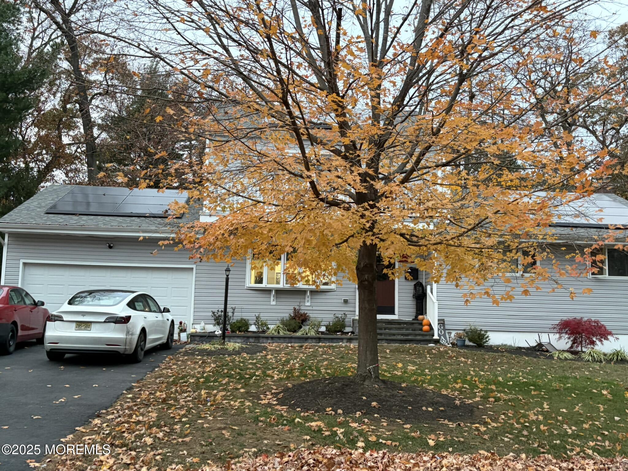 11 Chestnut Ridge Road Holmdel, NJ 07733 - Photo 2 of 44 a couple of cars parked in front of a house