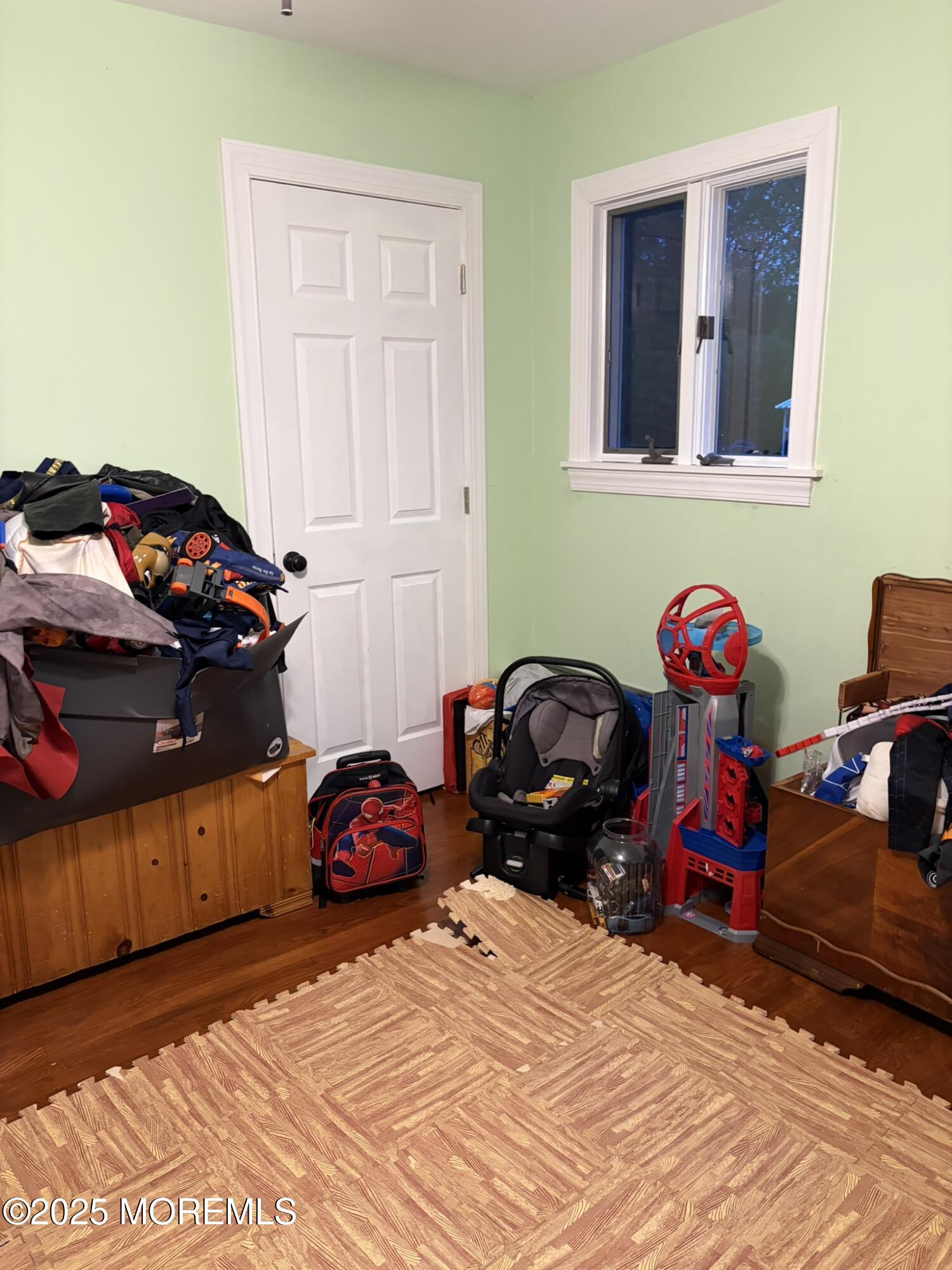 11 Chestnut Ridge Road Holmdel, NJ 07733 - Photo 23 of 44 a bedroom with bed and a closet