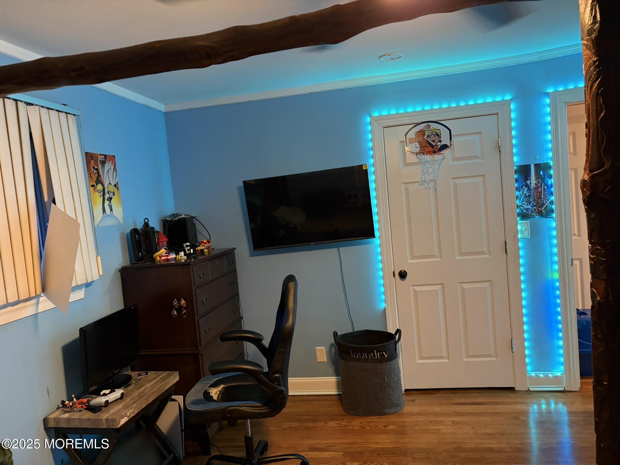 11 Chestnut Ridge Road Holmdel, NJ 07733 - Photo 26 of 44 a living room with furniture and a flat screen tv