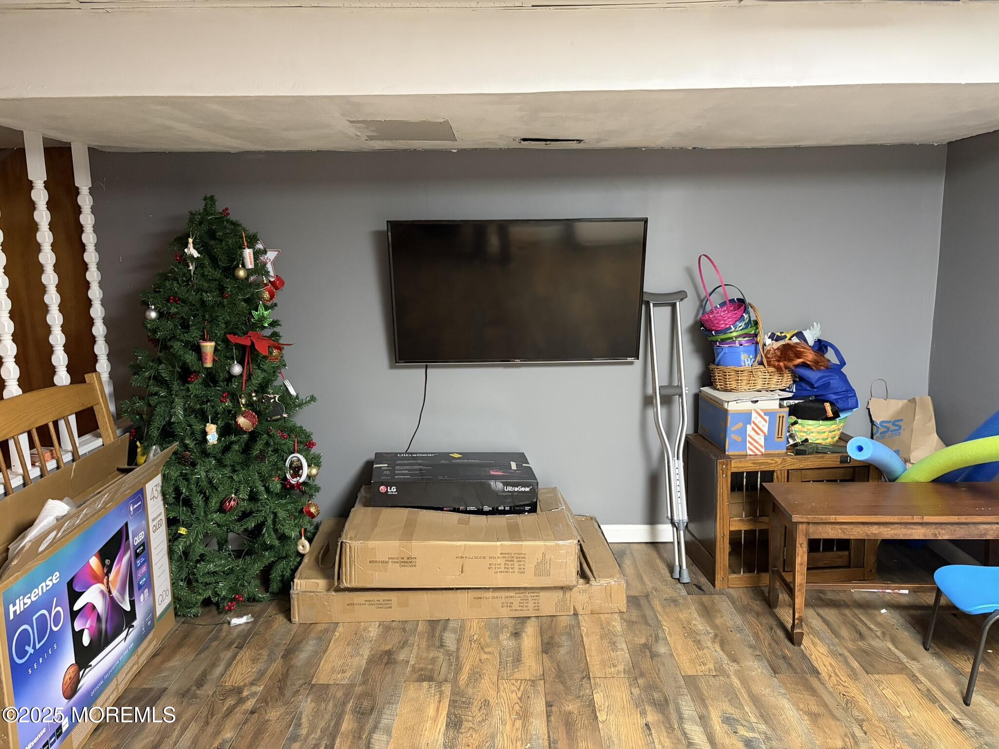 11 Chestnut Ridge Road Holmdel, NJ 07733 - Photo 41 of 44 a living room with a couch and a potted plant