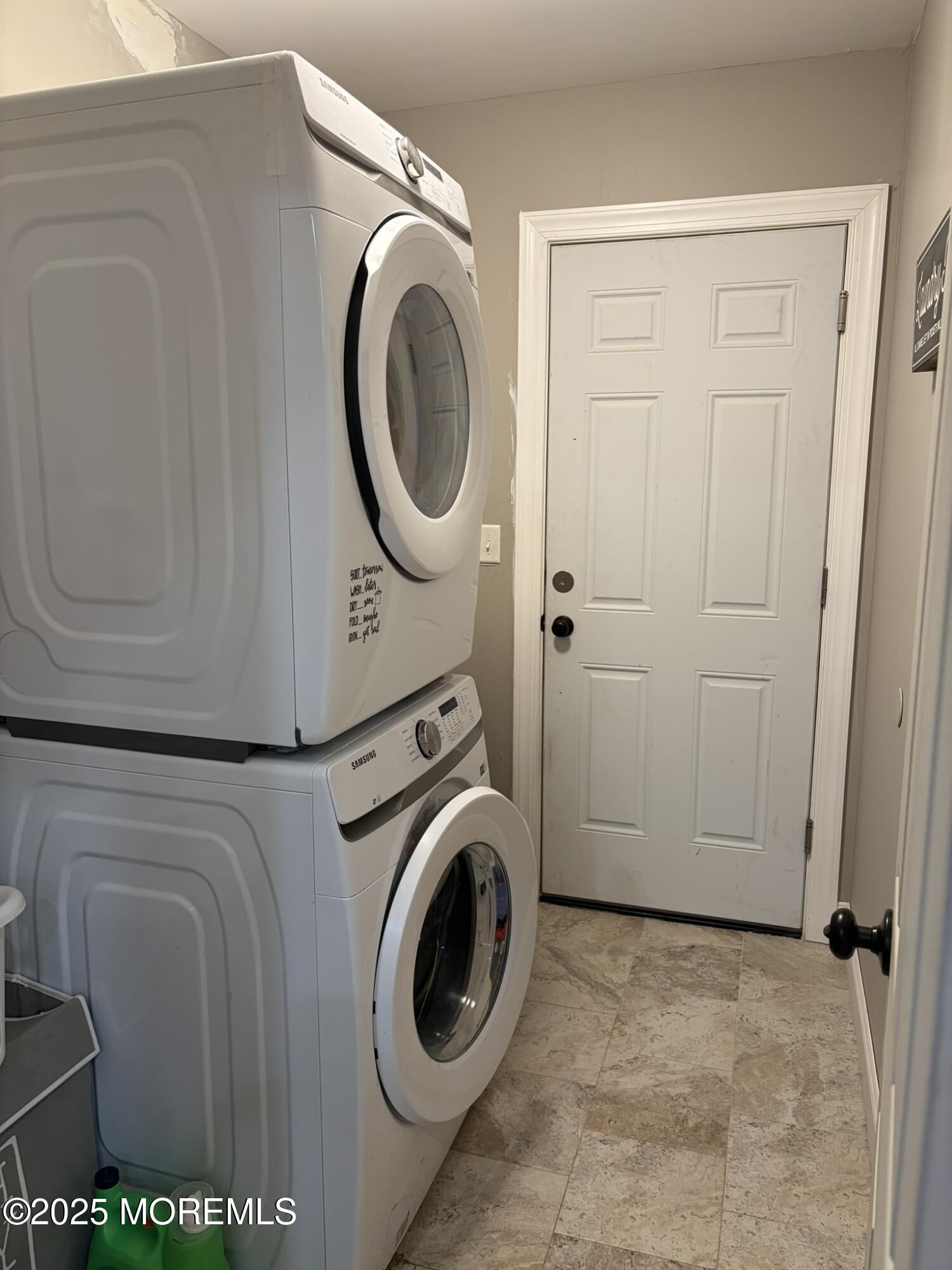 11 Chestnut Ridge Road Holmdel, NJ 07733 - Photo 44 of 44 a utility room with dryer and washer