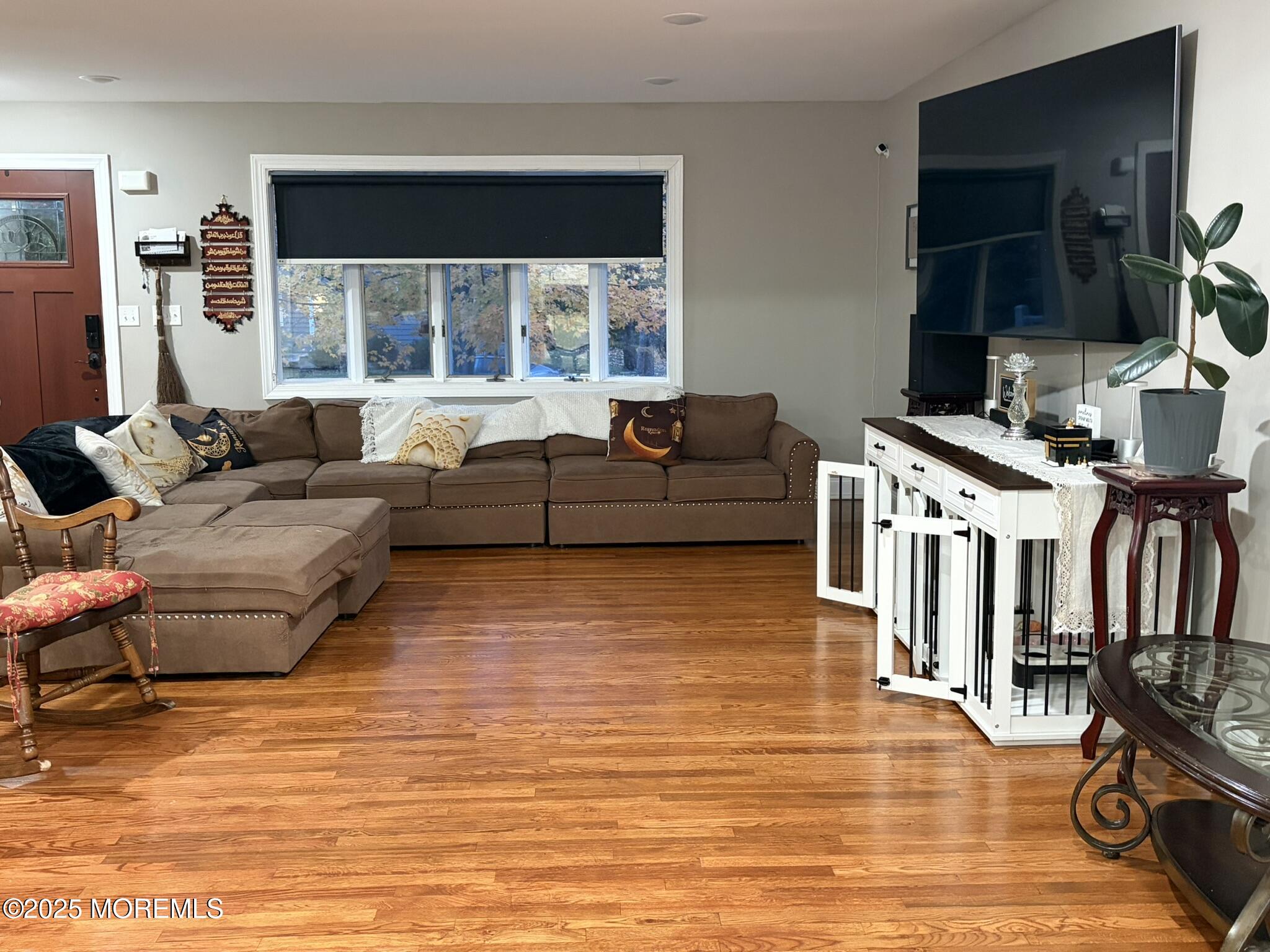 11 Chestnut Ridge Road Holmdel, NJ 07733 - Photo 7 of 44 a living room with furniture window and a flat screen tv