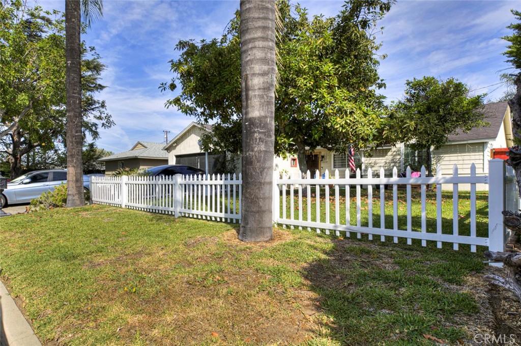1029 East Galatea Street Azusa, CA 91702 - Photo 2 of 36 a view of a house with a yard and plants