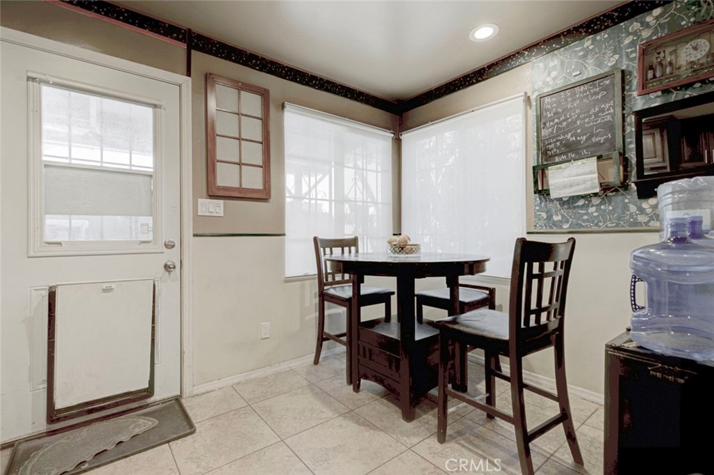 1029 East Galatea Street Azusa, CA 91702 - Photo 22 of 36 a dining room with furniture and window