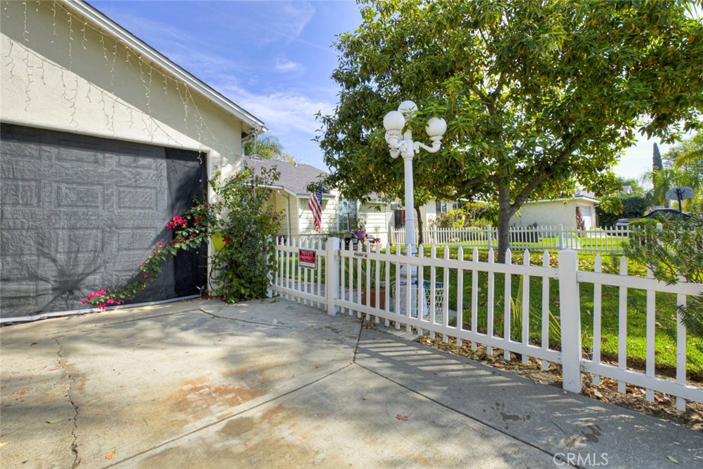 1029 East Galatea Street Azusa, CA 91702 - Photo 5 of 36 a view of street along with house and trees