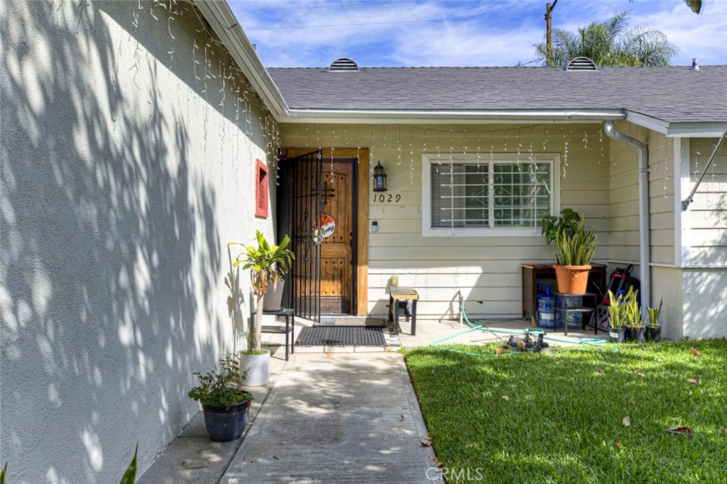 1029 East Galatea Street Azusa, CA 91702 - Photo 10 of 36 a front view of a house with outdoor seating
