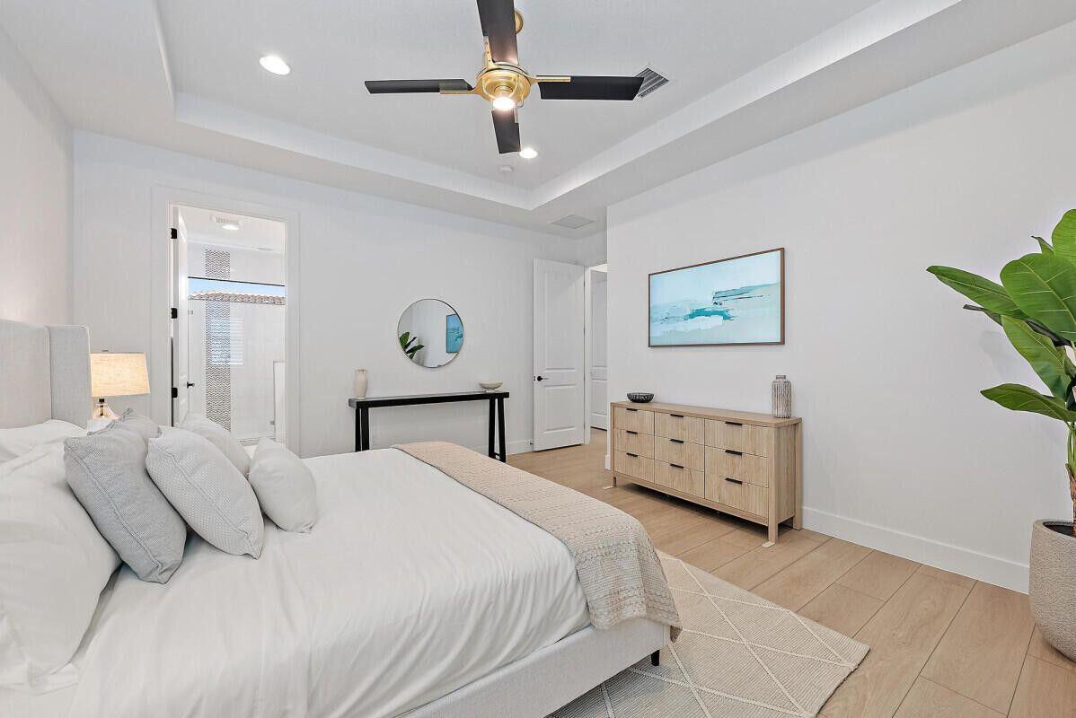 13197 Alton Road Palm Beach Gardens, FL 33418 - Photo 24 of 44 Primary Bedroom