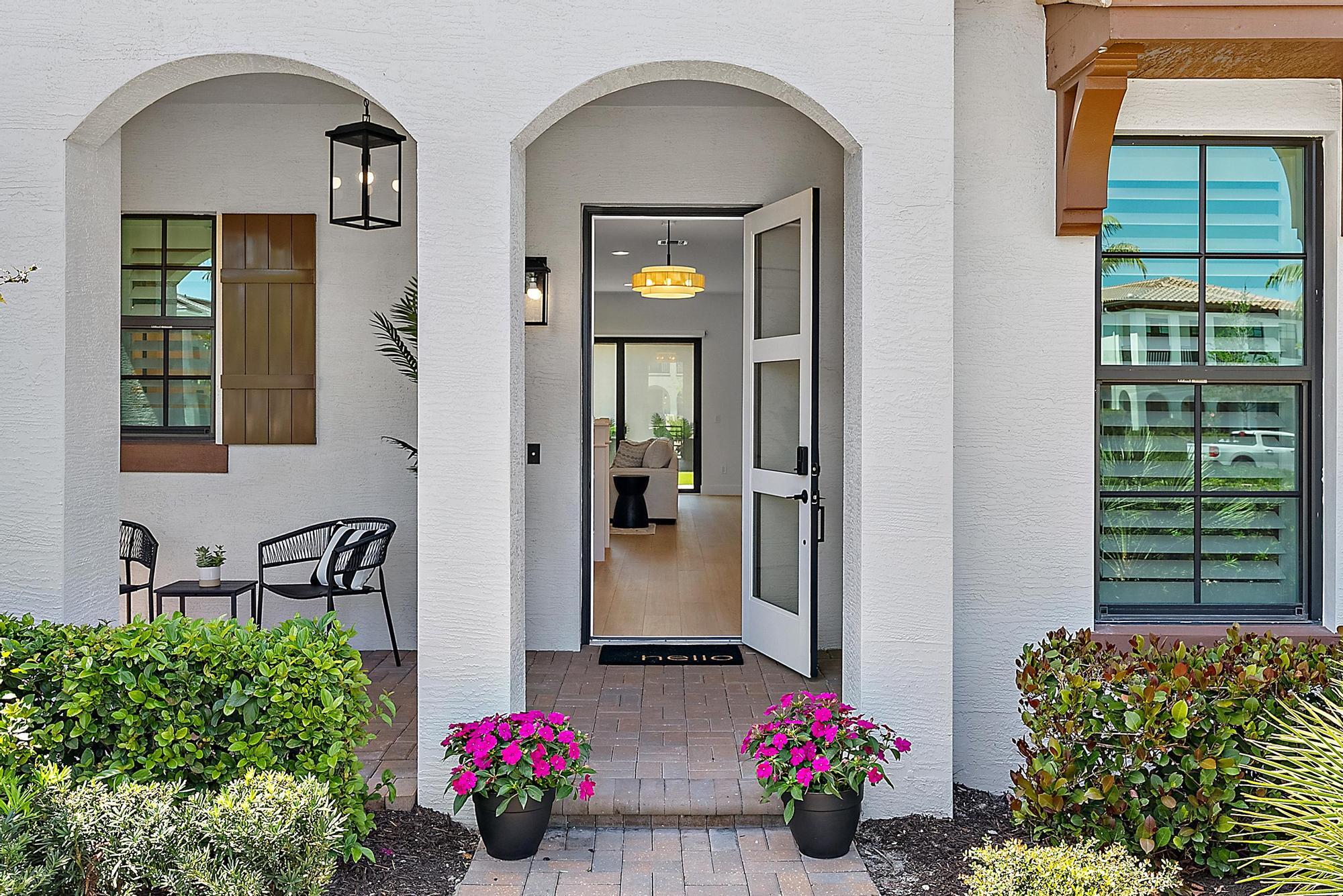 13197 Alton Road Palm Beach Gardens, FL 33418 - Photo 4 of 44 Front Entrance
